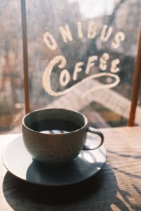 cozy cafe scene in tokyo with coffee cup